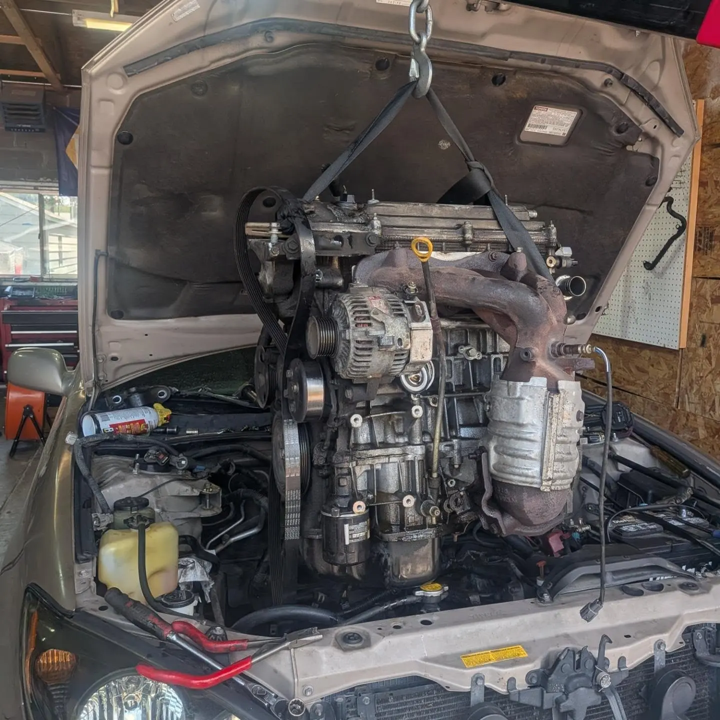 Engine bay during in-shop repair at Alaniz Complete Automotive in Greeley CO